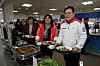 From right: Co-head of the Gangwon 2024 Winter Youth Olympics Organizing Committee Choi Jong-ku; Second Vice Minister of Sports Jang Mi-ran and Vice Minister of Food and Drug Safety Kim Yoo-mi wait in line at the Gangneung-Wonju National University cafeteria in Gangneung, Gangwon on Wednesday to eat a sample of the food that will be served to athletes during the Gangwon Youth Olympics set to begin on Jan. 19. [PARK SANG-MOON]