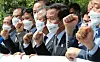 South Korean owners of factories at the Kaesong Industrial Complex, a linchpin of inter-Korean economic cooperation that was shuttered in 2016, hold a press conference protesting the dispatch of propaganda leaflets to North Korea in front of the central government complex in northern Seoul on Monday. [NEWS1]