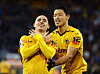 Wolverhampton Wanderers' Daniel Podence, left, celebrates with Hwang Hee-chan after scoring the sole goal in Wolves' 1-0 win over West Ham at Molineux Stadium in Wolverhampton, England on Saturday. Hwang played 73 minutes in the win, Wolves' second in the Premier League since Julen Lopetegui took the helm for the midlands club. Those two wins in four games tie the team's record over the previous 22 matches.  [REUTERS/YONHAP]
