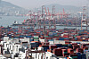 Cargo waiting for export piled up at a port in Busan on Oct. 27. The Bank of Korea announced that the economy grew 1.9 percent quarterly in the third quarter largely thanks to robust export. [YONHAP]