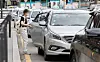 A customer gets in a taxi at Seoul Station on Tuesday. Starting Wednesday, cab hailing platforms including Kakao Taxi will be allowed to provide taxi sharing services. The companies must provide information on the destination and the time during which passengers will be sharing the ride. The app must have a function where the passenger can immediate contact the police or customer service in case of an emergency. Excluding van-type taxis, only passengers of the same gender are allowed to share a cab. Cab sharing has been legally banned since 1982. [YONHAP]