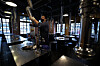 An owner of a restaurant in Dobong District, northern Seoul, on Thursday prepares for opening. Self-employed businesses, including bakeries, coin noraebang (booth-type singing rooms), cafes, restaurants and indoor gyms, gather in front of the Blue House on Thursday asking the government to end the prohibition on business from 9 p.m. to midnight, pushing for compensation for losses. [YONHAP]