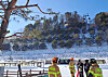 Rescue crews and first responders observe the scene of a gondola lift malfunction that stranded 64 skiers on Sunday morning in Pyeongchang County, Gangwon. All skiers made their way out safely after being stuck inside for more than 30 minutes. [YONHAP]