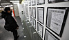 A man looks at a job bulletin board at an employment and welfare center in Mapo District, western Seoul, on Jan. 13. [NEWS1]