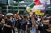 Over 200 unionized workers gathered in front of Kakao's headquarters in Pangyo, Gyeonggi, on Wednesday to protest against recent layoffs conducted by Kakao affiliates. [NEWS1]