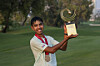 Fifa Laopakdee lifts the 2025 Asia-Pacific Amateur Championship trophy following a playoff at the Emirates Golf Club Majlis Course in Dubai, United Arab Emirates on Oct. 26. [AAC]