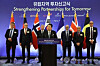 President Yoon Suk Yeol, center, speaks during a ceremony in Paris on June 21, 2023, where a group of European companies announced plans to make investments in Korea. [YONHAP]