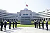 President Moon Jae-in, center left, National Intelligence Service (NIS) Director Park Jie-won, center right, and other government officials celebrate the installation of a stone inscribed with the new motto of the spy agency. [BLUE HOUSE]