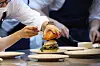 A premium burger is being crafted at Gordon Ramsay Burger in Songpa District, southern Seoul. [GORDON RAMSAY KOREA]