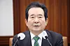 Prime Minister Chung Sye-kyun speaks at a Covid-19 response meeting on Friday. The government said it will keep the current social distancing levels for another three weeks, despite increases in new cases. [YONHAP]