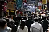 An alley in the restaurant district of Myeong-dong, central Seoul, is filled with people on Friday during lunch hours. [NEWS1]