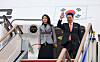 President Yoon Suk Yeol, right, and first lady Kim Keon Hee wave farewell aboard the presidential plane at Seoul Air Base before departing for their state visit to the Netherlands on Monday, marking Korea's first state visit to the European country since the two established diplomatic relations in 1961. [JOINT PRESS CORPS]