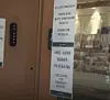 A notice on the store says, ″Free coffee for emergency workers.″ [SCREEN CAPTURE]
