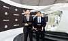 Korean Air Lines President Woo Kee-hong, left, and Supernal CEO Shin Jai-won pose for a photo after signing an MOU for the collaboration on the establishment of the UAM operational system at the Seoul ADEX 2023 on Tuesday. [KOREAN AIR LINES]