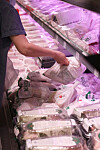 People purchase chicken at a supermarket in Seoul on Thursday ahead of Chobok, which marks the beginning of the hot season, on July 11. [YONHAP]
