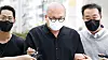Composer and producer Don Spike enters the Seoul Northern District Court in Dobong District, Northern Seoul, in September for a warrant review requested by the police. [NEWS1]