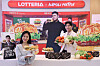 Models introduce the new Napoli Matfia Mozzarella Burger at a Lotteria branch near Sookmyung Women's University Station in Yongsan District, central Seoul, on Jan. 16. [YONHAP]
