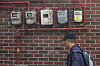 Gas meters on the side of a low-rise residential building in Seoul.  The government announced that until end of March the duties on imported LPG and LNG will be lifted to ease the burden on utility bills, especially low-income households that relies on the gas for heat during winter. [YONHAP]