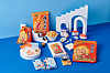Nongshim merchandise in collaboration with Bind and Earp Earp. The products feature illustrations of Nongshim's famous shrimp-flavored chip Saewookkang and stationary brand Earp Earp's brown bear character. [NONGSHIM]