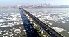 The Han River as seen from Gimpo, Gyeonggi, on Sunday. The Korea Meteorological Administration announced Sunday that the Han River froze for the first time this year, about 16 days earlier than average. [YONHAP]