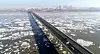 The Han River as seen from Gimpo, Gyeonggi, on Sunday. The Korea Meteorological Administration announced Sunday that the Han River froze for the first time this year, about 16 days earlier than average. [YONHAP]