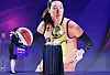 A Cheongju KB Stars mascot receives the MVP award on behalf of Park Ji-su at the 2021-22 Women's Professional Basketball Regular League Awards held at the 63 Convention Center in Yeouido, western Seoul on Monday. [YONHAP]