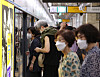 Commuters wear masks on a platform at Suyu Station in Gangbuk District, northern Seoul, on Wednesday. The Korea Disease Control and Prevention Agency announced the same day that the daily average number of Covid-19 cases during the previous week had surpassed 45,000. [NEWS1]