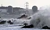The Kori nuclear power plants in Busan are seen on Wednesday as intense waves brought on by Typhoon Maysak batter nearby shores. Four of the power plants were temporarily shut down due to the storm. [YONHAP]