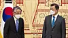 President Moon Jae-in, right, and Japanese Ambassador to Korea Koichi Aiboshi at the credentials presentation ceremony on Wednesday at the Blue House. [JOINT PRESS CORPS]
