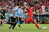 Cho Gue-sung, right, in action during a Group H match against Uruguay at the 2022 Qatar World Cup at Education City Stadium in Doha, Qatar on Nov. 24, 2022. [NEWS1]