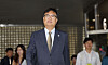 PPP lawmaker Chung Jin-suk leaves the Seoul Central District Court at Seocho-dong, Seoul, on Thursday after the court sentenced the lawmaker to six months in prison for defaming the late President Roh Moo-hyun. [YONHAP]