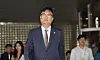 PPP lawmaker Chung Jin-suk leaves the Seoul Central District Court at Seocho-dong, Seoul, on Thursday after the court sentenced the lawmaker to six months in prison for defaming the late President Roh Moo-hyun. [YONHAP]