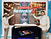 Staff at SK introduce an AI fortune teller powered by SK hynix's HBM3E chip. [SK GROUP]