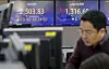 A screen in Hana Bank's trading room in central Seoul shows stock and foreign exchange markets open on Monday. [NEWS1]
