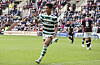 Celtic's Oh Hyeon-gyu celebrates scoring his side's second goal during a Scottish Premiership match against Heart of Midlothian at Tynecastle Park in Edinburgh on Sunday.  [AP/YONHAP]