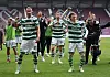 Celtics goal scorers Kyogo Furuhashi and Oh Hyeon-gyu celebrate with teammates after winning the Scottish Premiership at Tynecastle Park in Edinburgh on Sunday. [REUTERS/YONHAP]