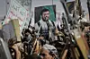 Houthi supporters chant slogans and hold pictures of Abdul Malik al-Houthi, the leader of the Houthi movement, during an anti-U.S. and anti-Israel rally in Sanaa, Yemen, on March 17. [AP/YONHAP]