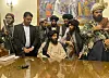 Taliban fighters take control of the presidential palace in Kabul Sunday after Afghan President Ashraf Ghani fled the country. [AP/YONHAP]