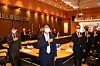 Korean diplomats from the embassy and consulates in China, including Korean Ambassador to China Jang Ha-sung, center front, salute the Korean flag at the beginning of a meeting in Beijing on July 9. [YONHAP]