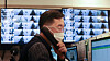 An official answers the phone while monitoring CCTVs at a community treatment center for Covid-19 patients who are asymptomatic or have mild symptoms in Yeongdeungpo District, western Seoul, Sunday. [NEWS1]