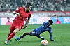 Korea's Kim Min-jae, left, in action during a World Cup qualifer against Singapore at Seoul World Cup Stadium in western Seoul on Nov. 16, 2023. [YONHAP]
