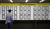 A person looks at a job bulletin board at an employment welfare center in Mapo District, western Seoul. [NEWS1]