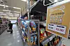 Emart's opening hours sign is posted on Emart supermarket in Jung District, central Seoul on Tuesday. [YONHAP]