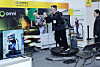 A model explores virtual reality content on a 360-degree rotating treadmill at the Korea Metaverse Festival 2025, hosted by the Ministry of Science and ICT, in Kintex in Goyang, Gyeonggi, on Nov. 12. [YONHAP]
