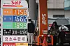 Prices are displayed at a gas station in Seoul on March 2. [YONHAP]