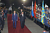 North Korean leader Kim Jong-un, right, salutes an honor guard in a welcome ceremony after crossing the border to Russia at Khasan Tuesday, where he was greeted by Russian Minister of Natural Resources and Ecology Alexander Kozlov, left, in a photo provided by the North’s Korean Central News Agency Wednesday. [YONHAP]