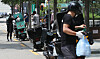 Delivery rider motorcycles are parked in Mapo District, western Seoul, on Monday. Monday was the first day of stricter social distancing measures, and food deliveries surged as many stayed indoors to eat. [YONHAP]