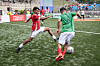 England's Mikiale Tsegay, left, vies for the ball during a 2024 Homeless World Cup match against Mexico at Hanyang University in eastern Seoul on Thursday. [HOMELESS WORLD CUP]