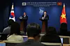 President Yoon Suk Yeol, right, announces a statement with Vietnamese President Nguyen Xuan Phuc during the Vietnamese leader's state visit to Korea in December. [NEWS1]