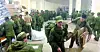 A screen capture shows soldiers, believed to be North Koreans, receiving basic supplies at a Russian training base on Oct. 19 in a video provided by the Ukrainian Center for Strategic Communication and Information Security, also known as Spravdi. [SCREEN CAPTURE]